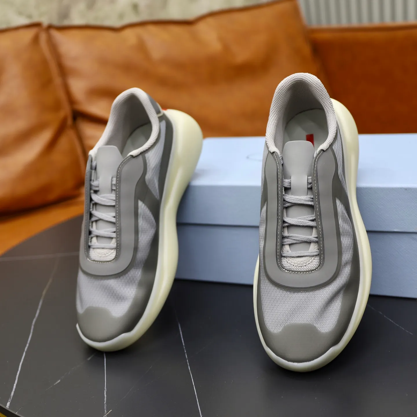 Men's Shoes 💰760💰 PRADA America's Cup Recycled Nylon and Bike Fabric Sneakers Practical and innovative, these regenerated nylon sneakers are modern, with lightweight soles and minimalist details. The upper is decorated with temperature-locking adhesive tape, screen-printed ADA logo, nylon loop shoelaces, T sole, made of ultra-light foam rubber filling material, rubber pattern texture, sole height: 40 mm, removable fabric-covered insole, Size 39-44